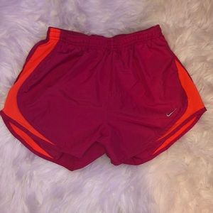 Pink and orange Nike shorts